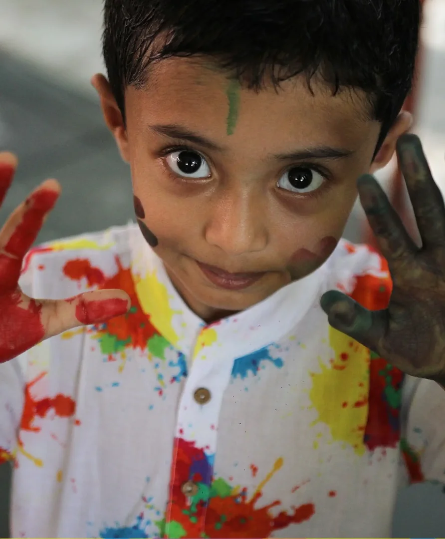 girl writing on a chalkboard