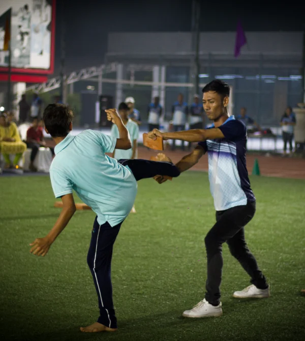 pupils sitting on campus steps